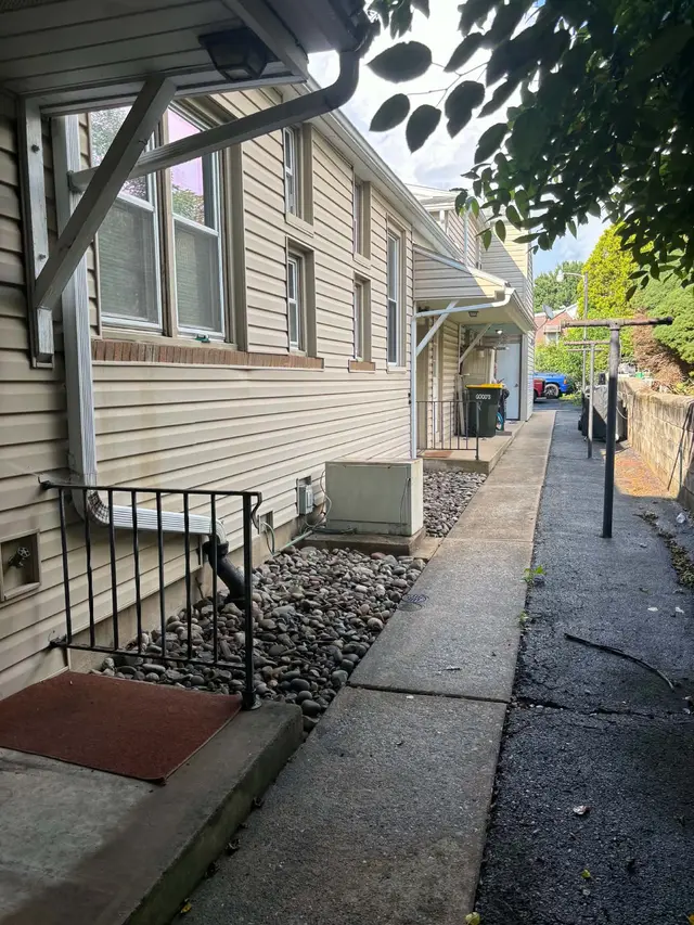Side walkway cleared and finished with river rock